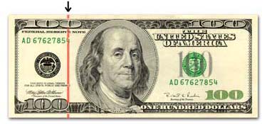 One Hundred Dollar Bill under UV light